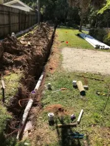 Adams Plumbing & Drain Company repairing a damaged sewer line in Hillsdale, AL