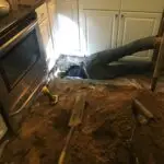 Adams Plumbing & Drain Company repairing slab leak in Sheldon, Mobile, AL