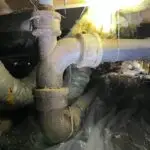 Adams Plumbing & Drain Company replacing cast iron drain pipe in Jackson Heights, Mobile, AL