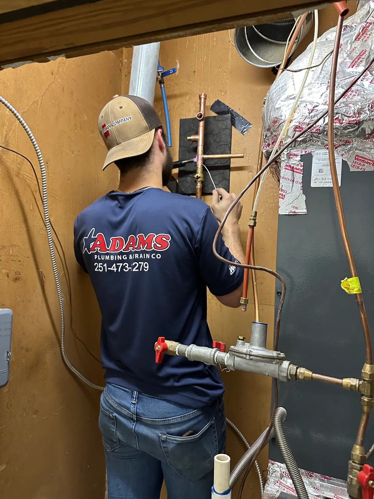 Adams Plumbing & Drain Company replacing a water heater in D’Iberville, Mobile, AL