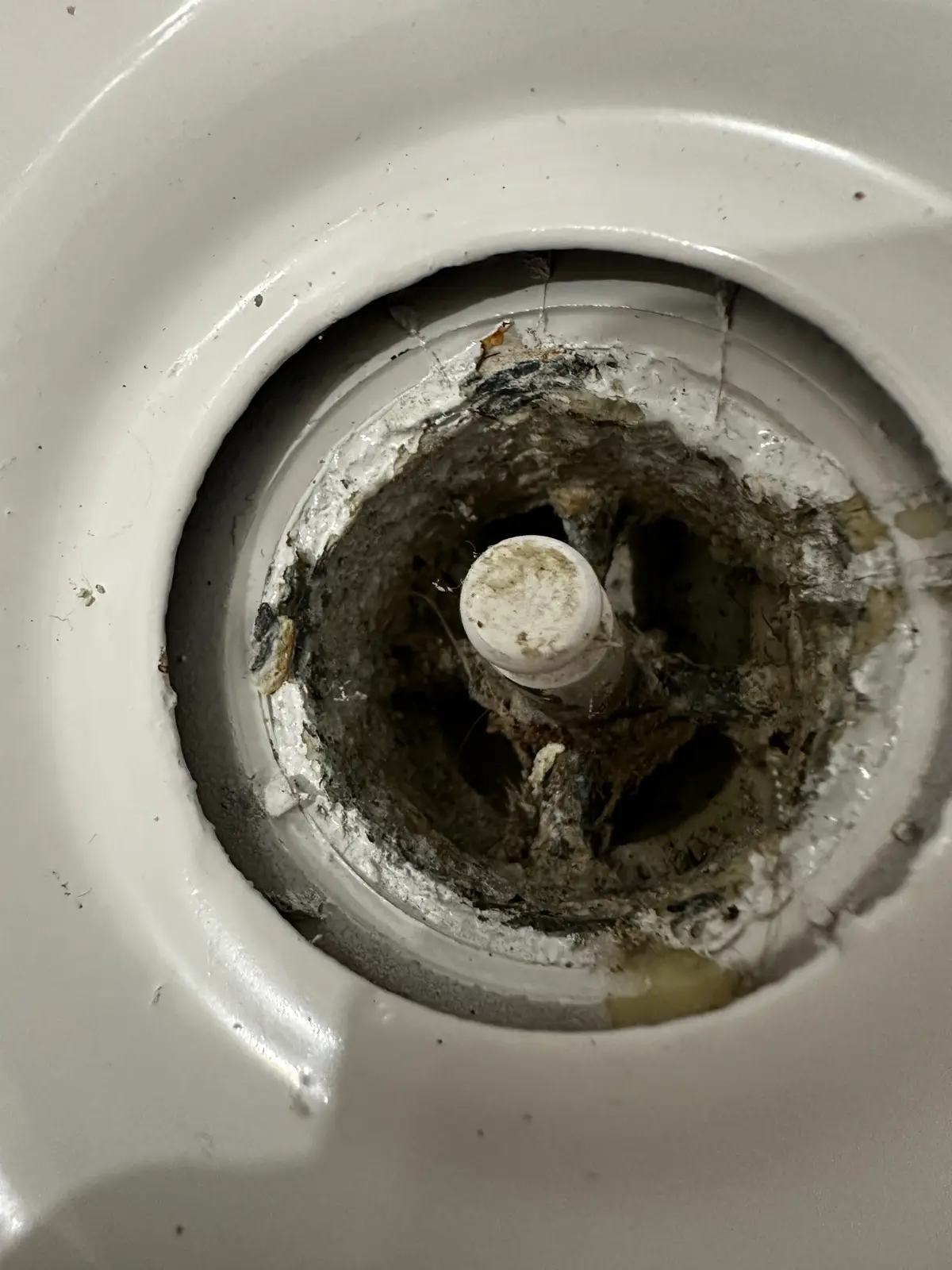 Plumber clearing a clogged drain in Devonshire, AL for Adams Plumbing & Drain Company