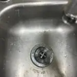 Adams Plumbing & Drain Company performing kitchen drain cleaning in D'Iberville, AL