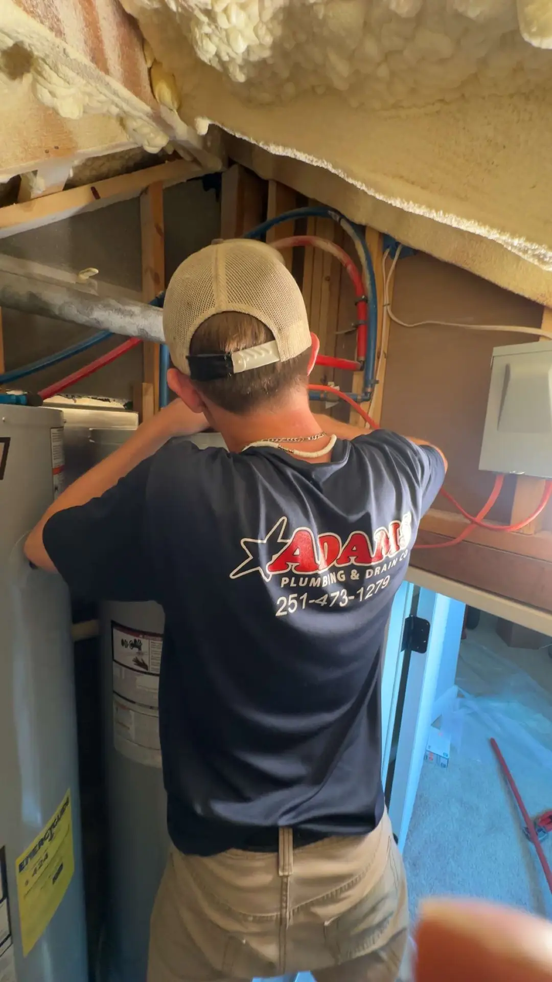 Adams Plumbing & Drain Company replacing a broken water heater in a Westhill, AL home